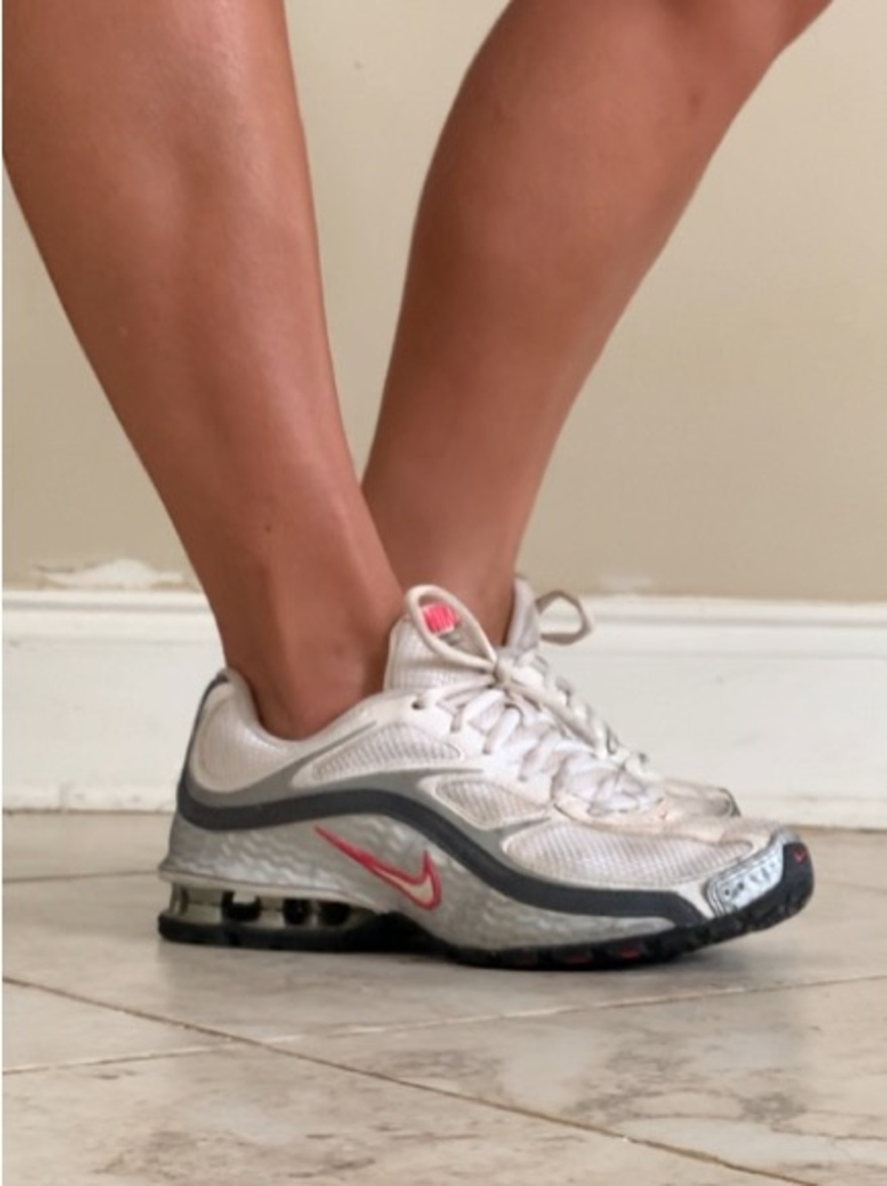 Nike Reax discontinued women’s running shoes w/metallic silver & pink accents